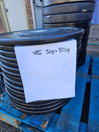 Technogym Bumper Competition Colour coded weight plates with Sandwich racks