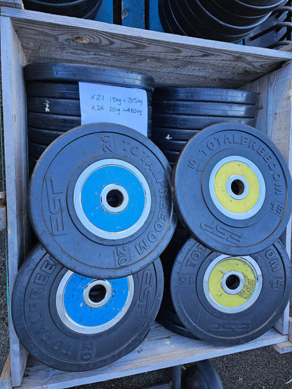 Technogym Bumper Competition Colour coded weight plates with Sandwich racks