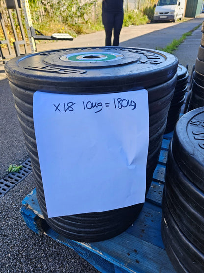 Technogym Bumper Competition Colour coded weight plates with Sandwich racks